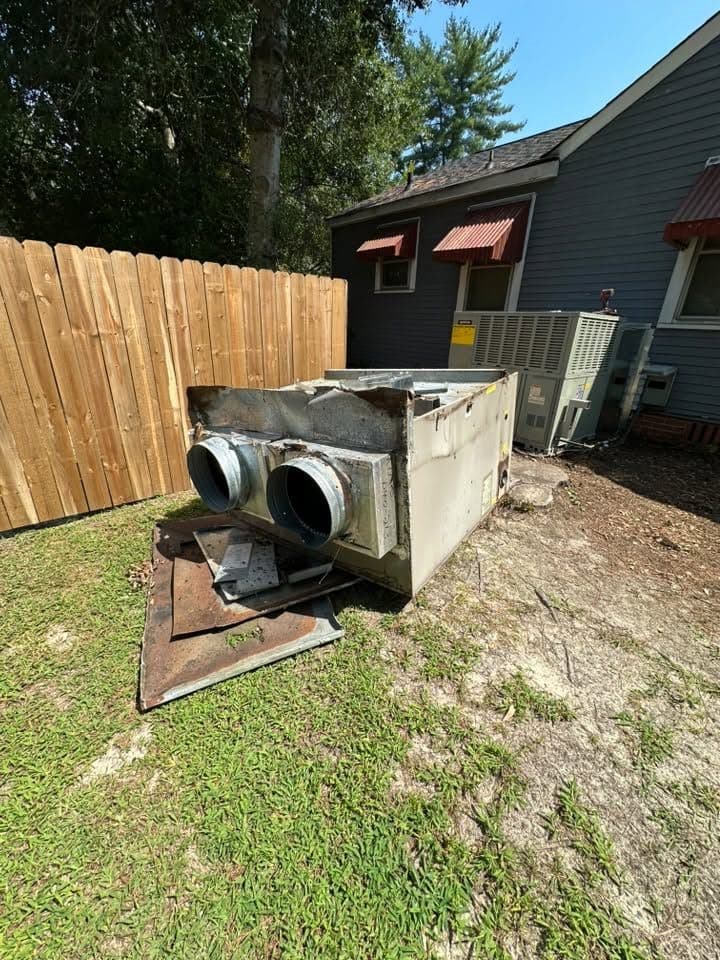 Junk pile before the Appliance & HVAC removal at a customer's home
