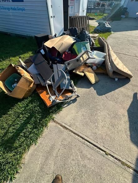 Junk pile before the Storage unit cleanout at a customer's home